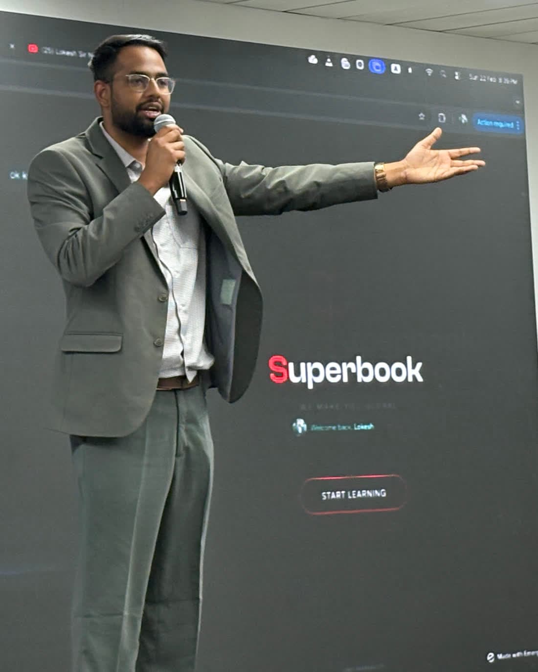 Lokesh Bhardwaj, founder of PDFCart, speaking on stage at a technology conference